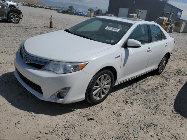 TOYOTA CAMRY HYBR 2014 with VIN 4T1BD1FK8EU110382 - Photo from auction