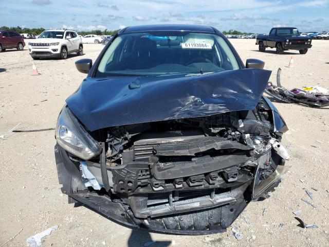 Снимка 5 от търг – 2018 FORD FOCUS SE с VIN 1FADP3F22JL299939