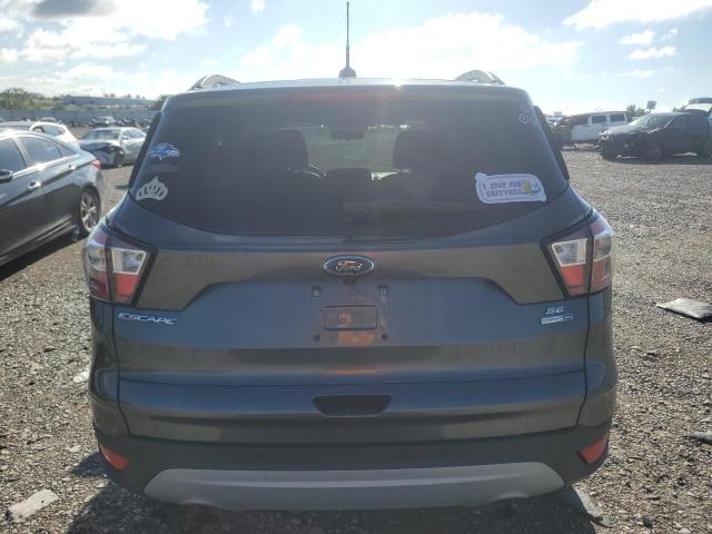 Photo 6 from auction – 2017 FORD ESCAPE SE with VIN 1FMCU9GD5HUE67820