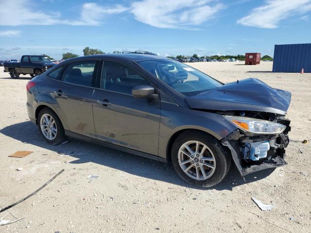 Снимка 4 от търг – 2018 FORD FOCUS SE с VIN 1FADP3F22JL299939