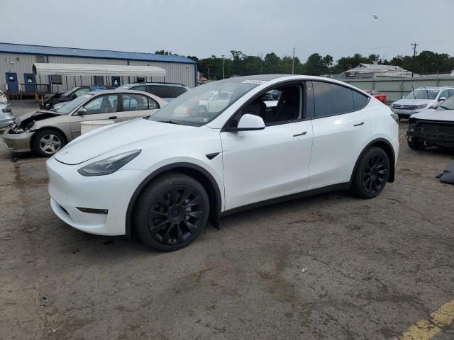 TESLA MODEL Y 2023 with VIN 7SAYGAEE3PF669631 - Photo from auction