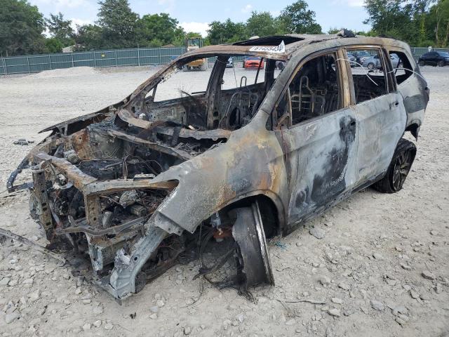 HONDA PILOT TOUR 2018 with VIN 5FNYF6H96JB055451 - Photo from auction