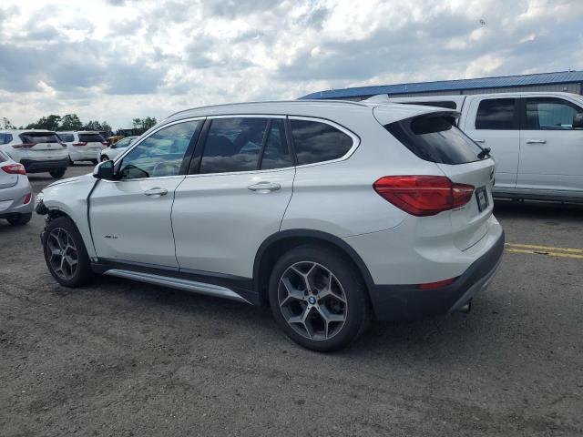 Photo 2 from auction – 2016 BMW X1 XDRIVE2 with VIN WBXHT3C38G5E48068