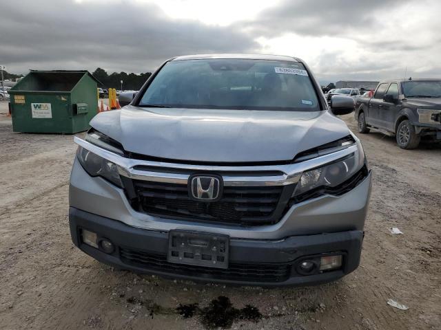 Photo 5 from auction – 2020 HONDA RIDGELINE with VIN 5FPYK3F52LB012942