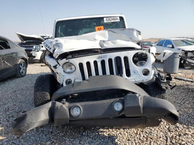 Photo 5 from auction – 2014 JEEP WRANGLER U with VIN 1C4BJWFG1EL127553
