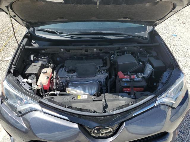 Photo 12 from auction – 2018 TOYOTA RAV4 LE with VIN JTMZFREV3JJ168628