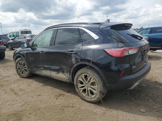 Photo 2 from auction – 2021 FORD ESCAPE SEL with VIN 1FMCU9H63MUB09741