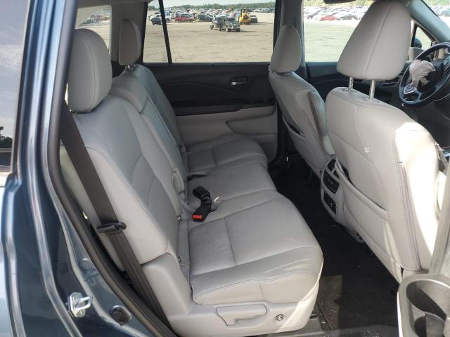 Photo 11 from auction – 2021 HONDA PILOT TOUR with VIN 5FNYF5H98MB025947