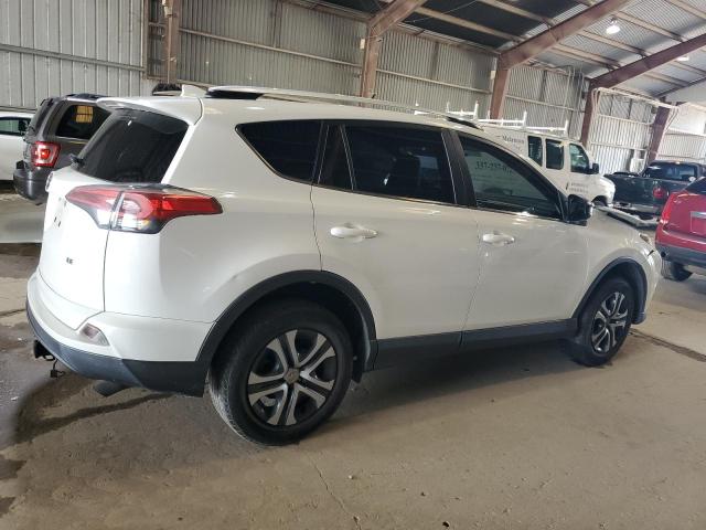 Photo 3 from auction – 2016 TOYOTA RAV4 LE with VIN JTMZFREV4GJ085878