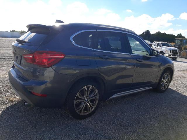 Photo 3 from auction – 2017 BMW X1 XDRIVE2 with VIN WBXHT3C32H5F74928