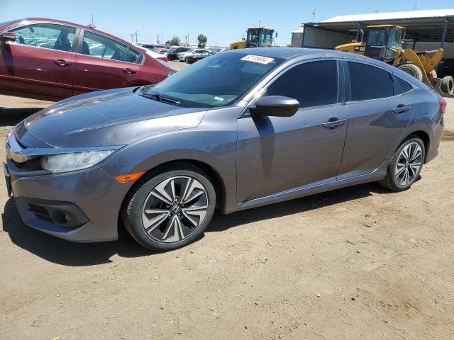 HONDA CIVIC EX 2017 with VIN 19XFC1F37HE006650 - Photo from auction