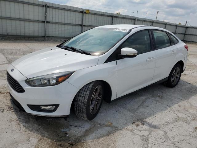 FORD FOCUS SE 2017 with VIN 1FADP3FE9HL309600 - Photo from auction