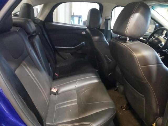 Foto 10 de la subasta – 2014 FORD FOCUS SE con VIN 1FADP3F28EL147427