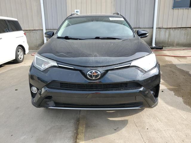 Photo 5 from auction – 2017 TOYOTA RAV4 XLE with VIN 2T3WFREV1HW403977