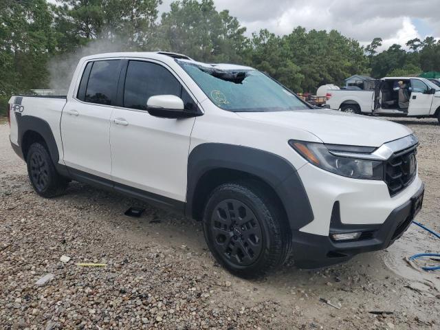 Photo 4 from auction – 2023 HONDA RIDGELINE with VIN 5FPYK3F57PB055095