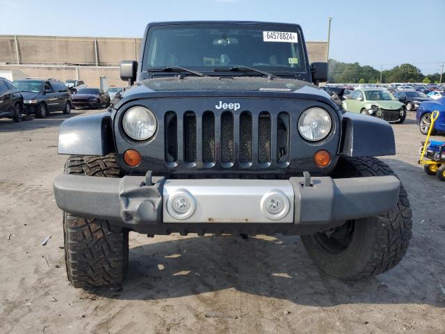 Photo 5 from auction – 2011 JEEP WRANGLER U with VIN 1J4HA5H16BL632670