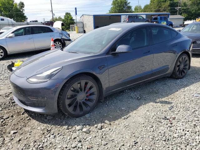 TESLA MODEL 3 2022 with VIN 5YJ3E1EC7NF243854 - Photo from auction