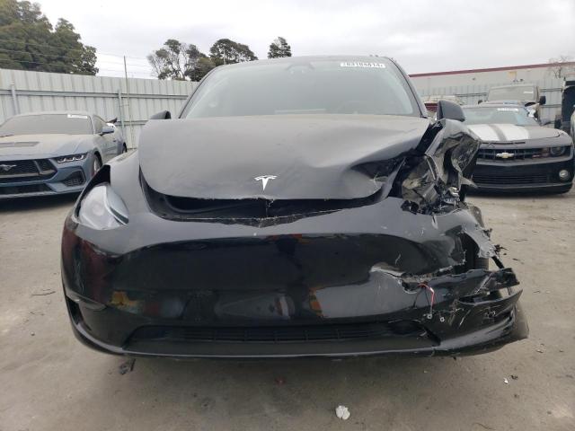 Photo 5 from auction – 2023 TESLA MODEL Y with VIN 7SAYGAEE6PF899504