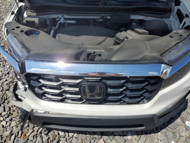 Photo 12 from auction – 2023 HONDA PASSPORT E with VIN 5FNYF8H54PB025852