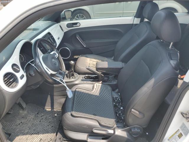 Photo 7 from auction – 2013 VOLKSWAGEN BEETLE with VIN 3VWHX7AT2DM656457