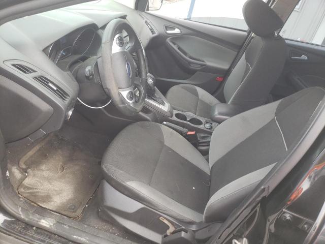 Photo 7 from auction – 2014 FORD FOCUS SE with VIN 1FADP3F24EL291878