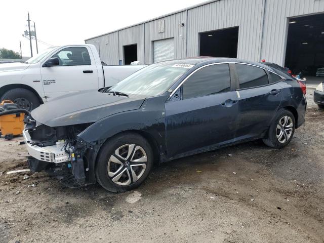 HONDA CIVIC LX 2016 with VIN 19XFC2F50GE048129 - Photo from auction