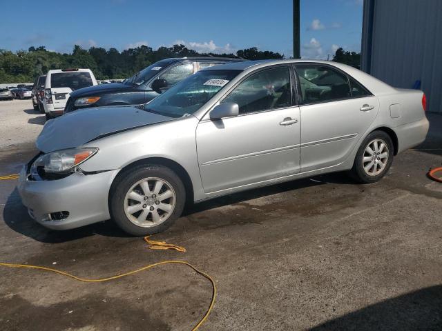 TOYOTA CAMRY LE 2003 with VIN 4T1BE30K63U136073 - Photo from auction