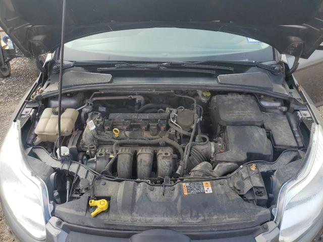 Photo 11 from auction – 2014 FORD FOCUS SE with VIN 1FADP3F25EL406486