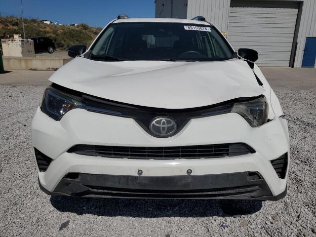 Photo 5 from auction – 2017 TOYOTA RAV4 LE with VIN JTMBFREV2HJ113857