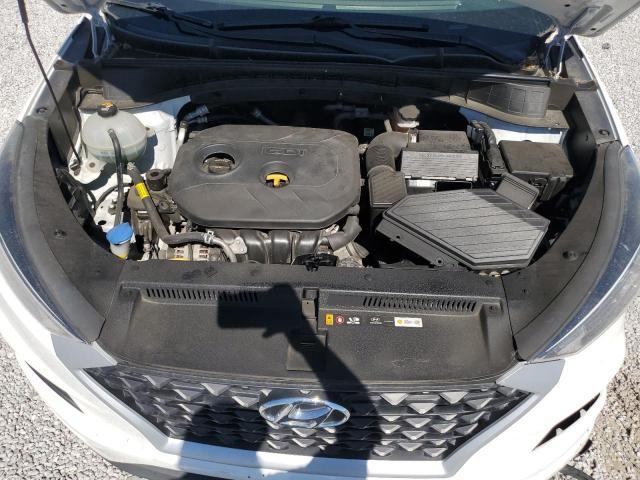 Photo 11 from auction – 2020 HYUNDAI TUCSON SE with VIN KM8J2CA43LU076063