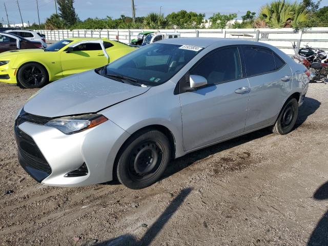 TOYOTA COROLLA L 2017 with VIN 2T1BURHE3HC852071 - Photo from auction