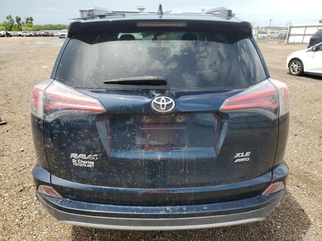 Photo 6 from auction – 2017 TOYOTA RAV4 XLE with VIN JTMRFREV6HD214803