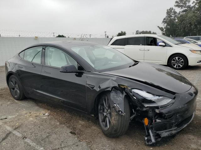 Photo 4 from auction – 2023 TESLA MODEL 3 with VIN 5YJ3E1EBXPF715720