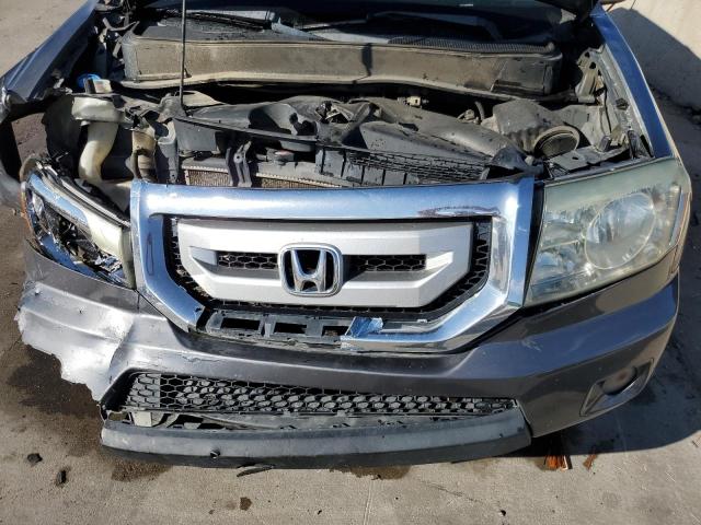 Photo 12 from auction – 2011 HONDA PILOT TOUR with VIN 5FNYF4H94BB018484