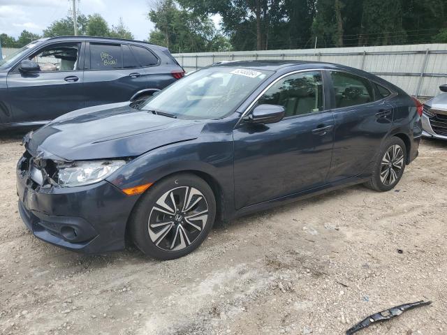 Photo 1 from auction – 2018 HONDA CIVIC EX with VIN JHMFC1F31JX027336