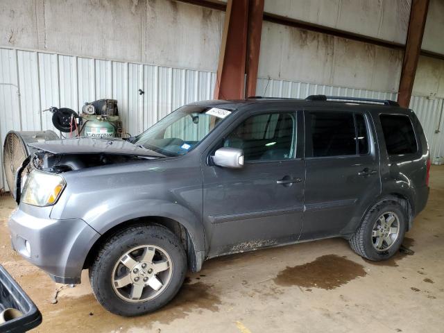 HONDA PILOT TOUR 2010 with VIN 5FNYF4H98AB033939 - Photo from auction
