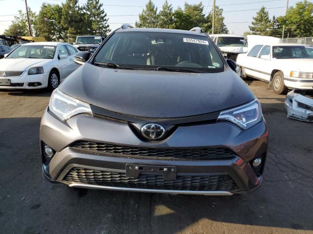 Photo 5 from auction – 2018 TOYOTA RAV4 SE with VIN JTMJFREV9JJ192204