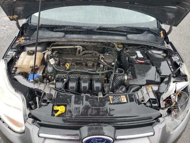 Photo 11 from auction – 2014 FORD FOCUS SE with VIN 1FADP3F24EL293792