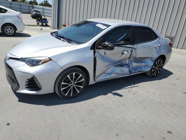 TOYOTA COROLLA L 2017 with VIN 5YFBURHE6HP704402 - Photo from auction