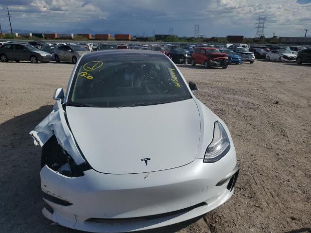 Photo 5 from auction – 2018 TESLA MODEL 3 with VIN 5YJ3E1EB0JF088954