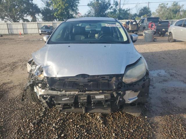 Photo 5 from auction – 2014 FORD FOCUS TITA with VIN 1FADP3J28EL320189
