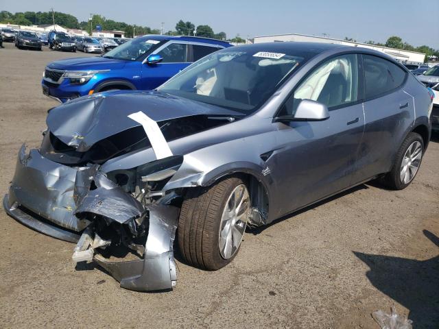 TESLA MODEL Y 2024 with VIN 7SAYGDEE0RA279295 - Photo from auction