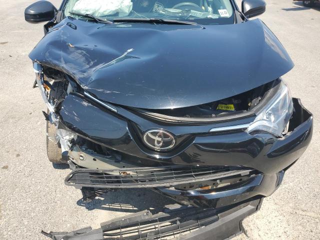 Photo 12 from auction – 2018 TOYOTA RAV4 LE with VIN 2T3BFREV0JW839899