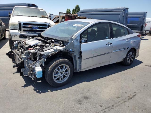 TOYOTA PRIUS PRIM 2018 with VIN JTDKARFP2J3075975 - Photo from auction