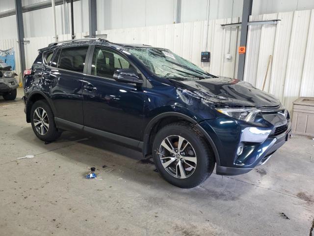 Photo 4 from auction – 2017 TOYOTA RAV4 XLE with VIN JTMRFREV5HJ143577