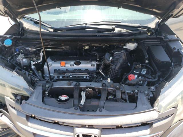 Photo 12 from auction – 2014 HONDA CR-V LX with VIN 3CZRM3H32EG715595