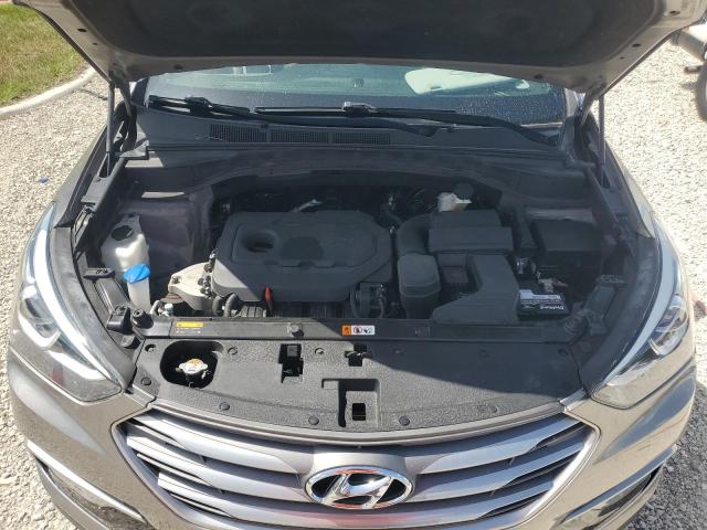 Photo 11 from auction – 2017 HYUNDAI SANTA FE S with VIN 5NMZU3LB0HH020271
