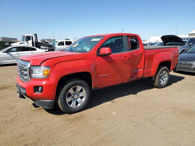 GMC CANYON SLE 2018 with VIN 1GTH6CEN1J1133563 - Photo from auction