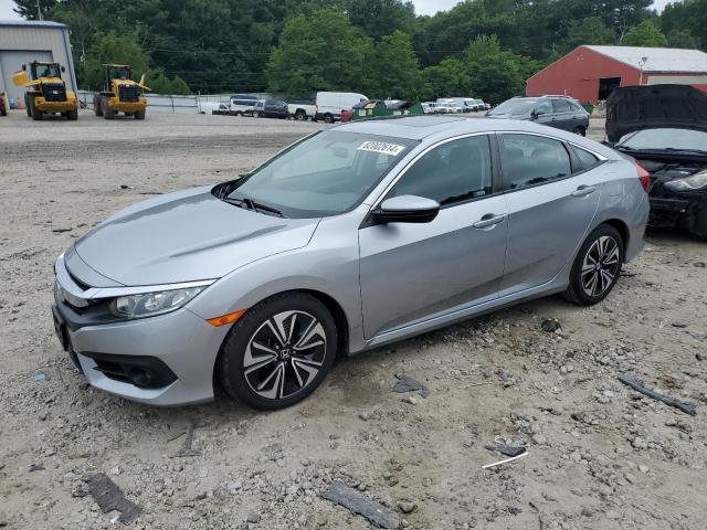 HONDA CIVIC EX 2018 with VIN 19XFC1F35JE201457 - Photo from auction