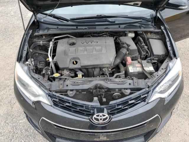 Photo 11 from auction – 2014 TOYOTA COROLLA L with VIN 2T1BURHE0EC046653